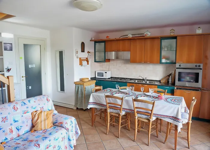 Апартаменты Sunsetbarbana - Tricamere Con Posto Auto Градо