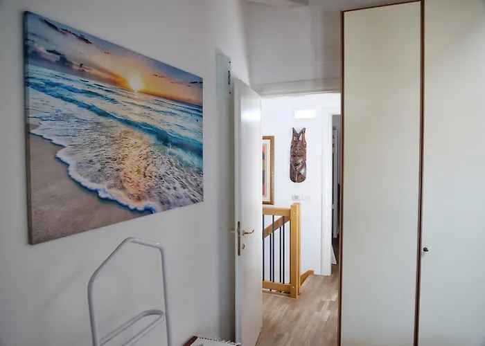 Апартаменты Sunsetbarbana - Tricamere Con Posto Auto